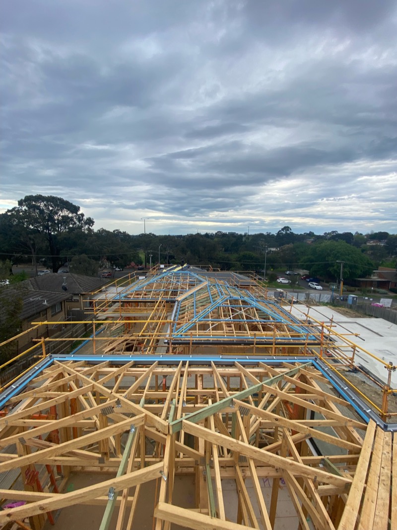 Three double-storey frames side by side on a Box Hill development