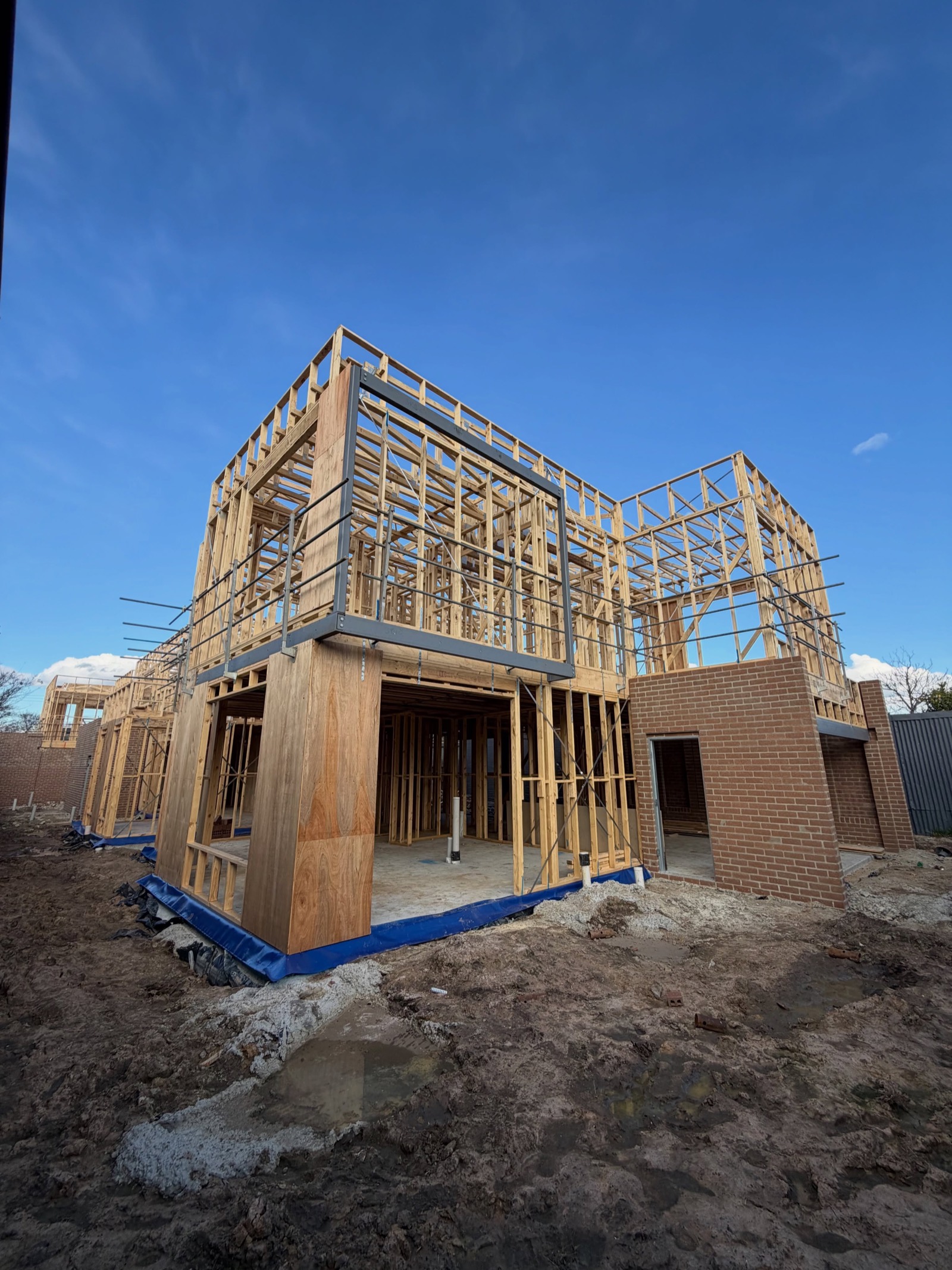 Double-storey frame against a blue sky in Malvern East